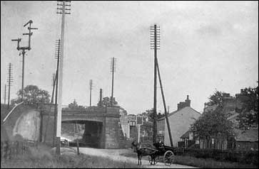 Overhead truck telephone routes, Denbigh Railway Bridge, Watling Street, Bletchley, circa 1900.