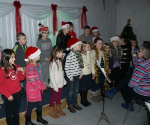 Young carol singers at MKCDC